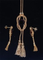 Lot 791 - A contemporary 18ct gold and garnet set...