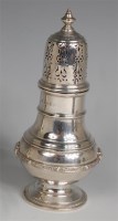 Lot 713 - A silver pedestal lighthouse sugar caster,...