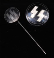 Lot 284 - A German SS lapel badge, together with a stick...