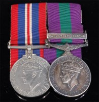 Lot 301 - A WW II War medal, together with Geo. VI...