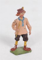 Lot 1250 - Britains, 587 village idiot in pink smock with...