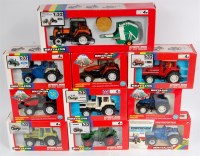 Lot 1394 - Britains 1/32nd scale Tractor and Boxed Set...