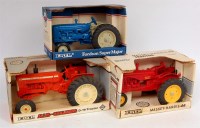 Lot 1421 - ERTL 1/16th tractor group, 3 boxed examples,...