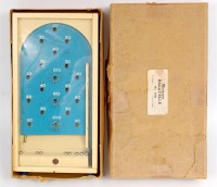 Lot 3154 - A Chad Valley miniature bagatelle, 11" x 6"...
