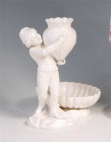 Lot 64 - A late Victorian Derby blanc-de-chine figure...