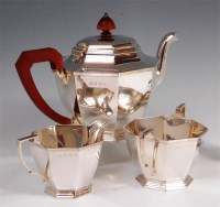 Lot 120 - An Art Deco silver three piece teaset,...