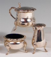 Lot 155 - An Edwardian silver three piece cruet set,...