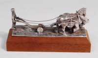 Lot 159 - A contemporary silver horse and plough figure...