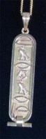 Lot 230 - A modern Eastern yellow gold pendant,...