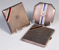 Lot 311 - An engine turned silver pocket cigarette case,...
