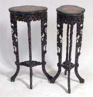Lot 351 - A pair of Chinese hardwood jardiniere stands,...