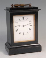 Lot 439 - A late 19th century ebonised mantel clock,...