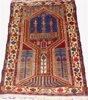 Lot 461 - An Afghan woollen prayer rug, decorated with...
