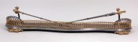 Lot 491 - A Victorian steel and gilt brass fire fender...