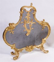 Lot 492 - A French Rococo Revival ormolu fire screen,...