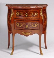 Lot 512 - A Louis XV style kingwood and marquetry bombe...