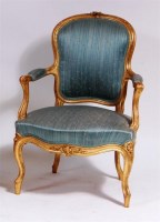 Lot 514 - A Louis XV style giltwood fauteuil, early 19th...