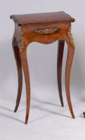 Lot 542 - A Louis XVI style walnut and ormolu mounted...