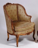 Lot 547 - A French Louis XV style giltwood Bergere, the...