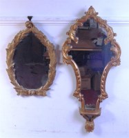 Lot 551 - A Rococo style giltwood wall mirror, with...