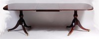 Lot 554 - A Georgian style mahogany twin pedestal dining...