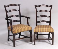 Lot 555 - A set of eight mahogany ladderback dining...