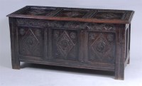 Lot 556 - A circa 1700 joined oak three panel coffer,...