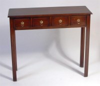 Lot 558 - A mahogany four drawer hall table, in the...