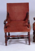 Lot 572 - A circa 1900 French oak armchair, having leaf...