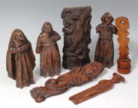 Lot 291 - A collection of early treen carvings, to...