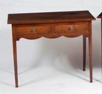 Lot 494 - A George III oak side table, having twin...