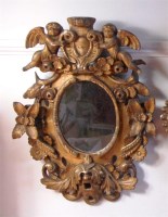 Lot 568 - An 18th century carved giltwood and gesso wall...