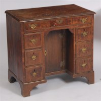 Lot 1611 - An early 18th century walnut and feather...