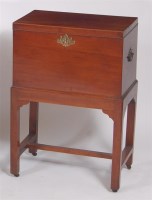 Lot 1639 - A late Georgian mahogany celleret, having...