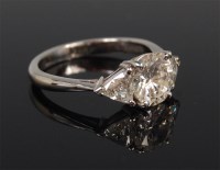 Lot 1298 - A contemporary ladies 18ct gold diamond ring,...