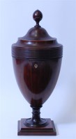 Lot 1398 - A late Georgian mahogany pedestal urn knife...