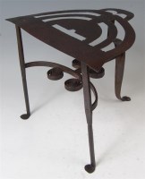 Lot 1406 - An 18th century steel footman, of good size,...