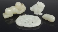 Lot 1429 - Four various Chinese celadon jade carvings, to...