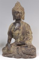 Lot 1437 - A Chinese bronze figure of a seated Buddha, in...