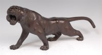 Lot 1438 - A Japanese Meiji period bronze tiger,...