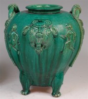 Lot 1448 - A Chinese green glazed earthenware vase, of...