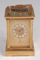 Lot 1554 - A 20th century polished gilt brass Petit...
