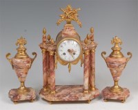 Lot 1560 - A circa 1900 French rouge marble and gilt...