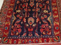 Lot 1575 - A Persian woollen rug, the blue ground...