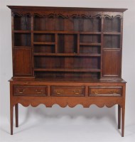Lot 1604 - An 18th century joined oak dresser, the upper...