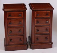 Lot 1607 - A pair of mahogany four drawer bedside chests,...