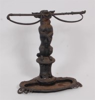 Lot 1621 - A Victorian cast iron dog stickstand, probably...