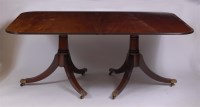 Lot 1640 - A mahogany twin pedestal dining table, in the...