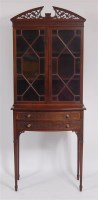 Lot 1651 - An Edwardian walnut cabinet on stand, having...