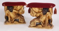 Lot 1657 - A pair of Venetian Blackamoor stools, circa...